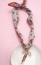 Load image into Gallery viewer, Floral Bow Scarf Charm Necklace
